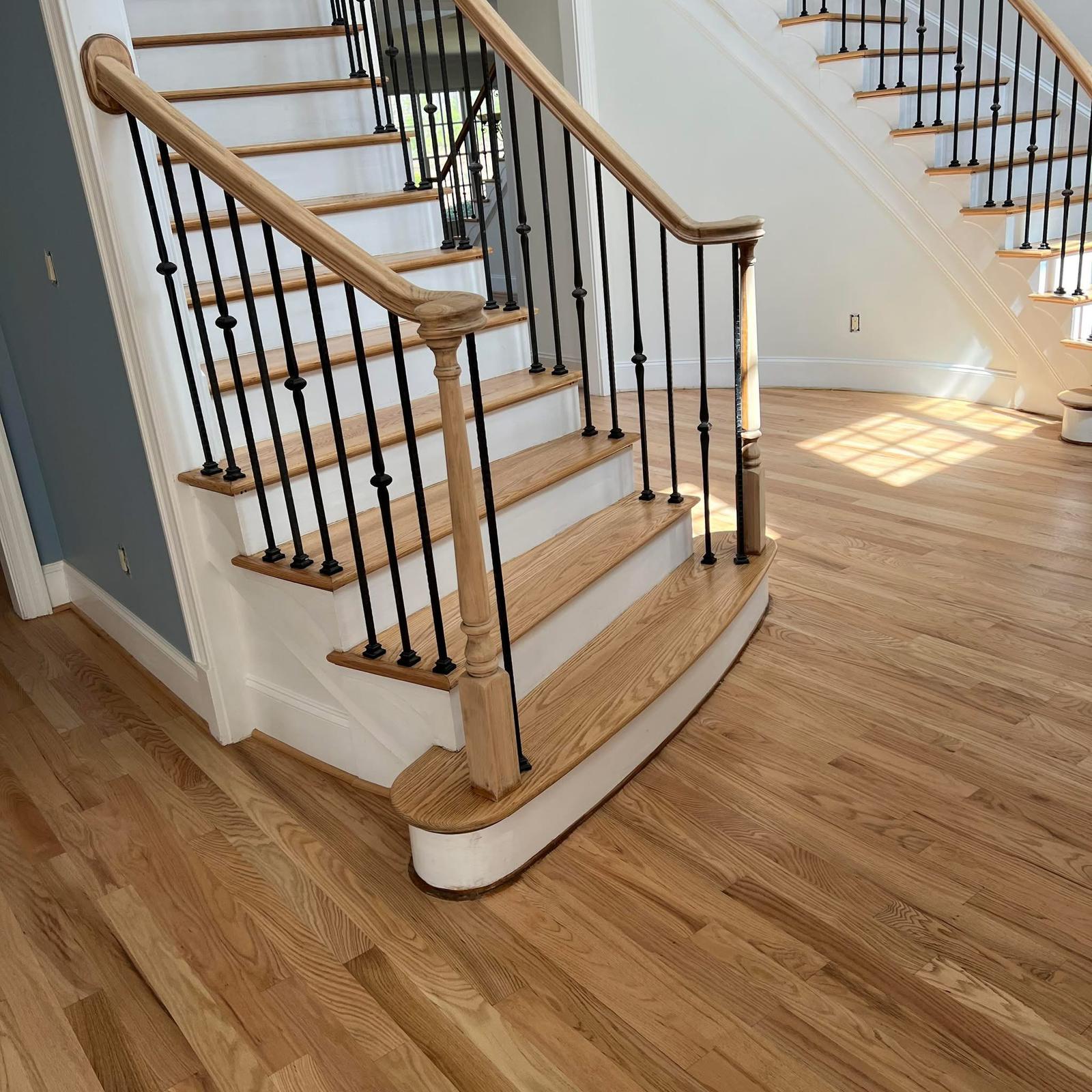 Beautifully refinished hardwood floor in an elegant living room